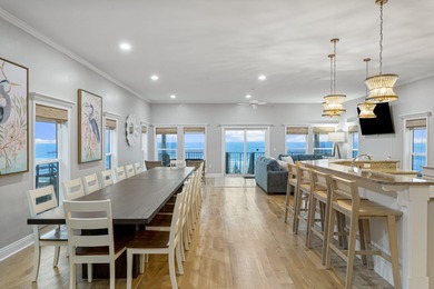 HIGHLIGHTS: - Beachfront beauty - Gorgeous Gulf views - 3 levels