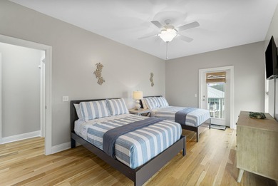 HIGHLIGHTS: - Beachfront beauty - Gorgeous Gulf views - 3 levels