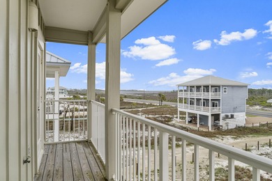HIGHLIGHTS: - Beachfront beauty - Gorgeous Gulf views - 3 levels