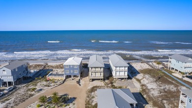 HIGHLIGHTS: - Beachfront beauty - Gorgeous Gulf views - 3 levels