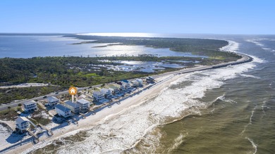 HIGHLIGHTS: - Beachfront beauty - Gorgeous Gulf views - 3 levels