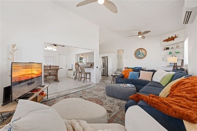 This beautifully remodeled 2-bedroom, 2.5-bath waterfront POOL