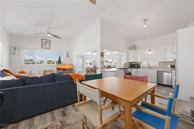 This beautifully remodeled 2-bedroom, 2.5-bath waterfront POOL