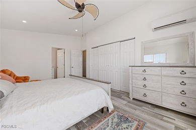 This beautifully remodeled 2-bedroom, 2.5-bath waterfront POOL