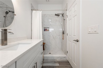 This beautifully remodeled 2-bedroom, 2.5-bath waterfront POOL