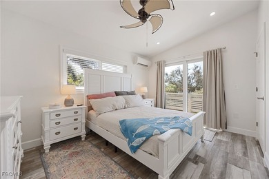 This beautifully remodeled 2-bedroom, 2.5-bath waterfront POOL