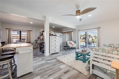 This beautifully remodeled 2-bedroom, 2.5-bath waterfront POOL