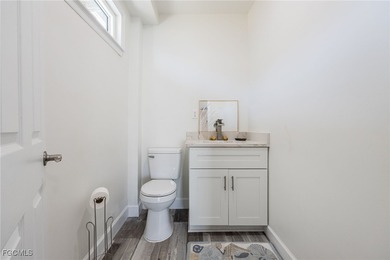 This beautifully remodeled 2-bedroom, 2.5-bath waterfront POOL