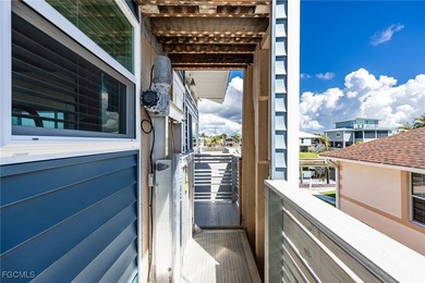 This beautifully remodeled 2-bedroom, 2.5-bath waterfront POOL