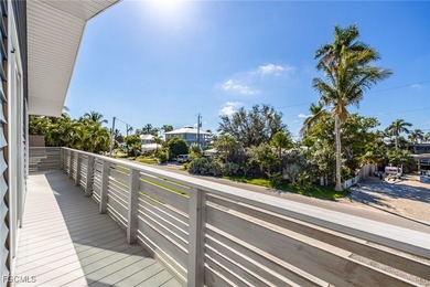 This beautifully remodeled 2-bedroom, 2.5-bath waterfront POOL