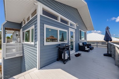 This beautifully remodeled 2-bedroom, 2.5-bath waterfront POOL