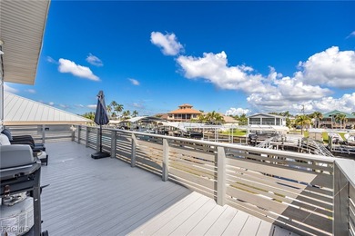 This beautifully remodeled 2-bedroom, 2.5-bath waterfront POOL