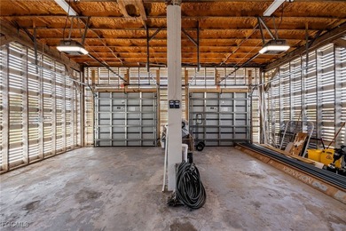 This beautifully remodeled 2-bedroom, 2.5-bath waterfront POOL