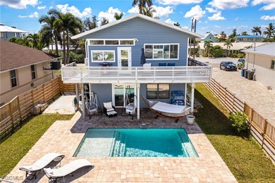 This beautifully remodeled 2-bedroom, 2.5-bath waterfront POOL