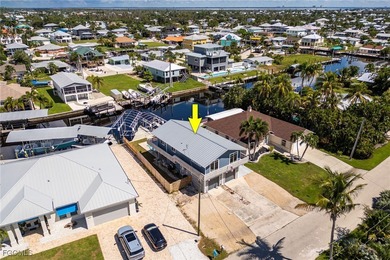 This beautifully remodeled 2-bedroom, 2.5-bath waterfront POOL