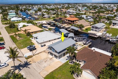 This beautifully remodeled 2-bedroom, 2.5-bath waterfront POOL