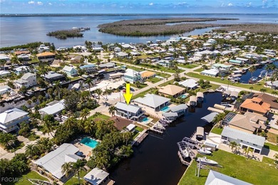This beautifully remodeled 2-bedroom, 2.5-bath waterfront POOL