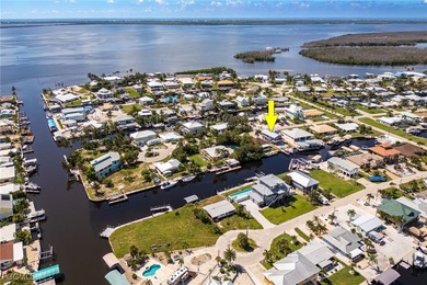 This beautifully remodeled 2-bedroom, 2.5-bath waterfront POOL