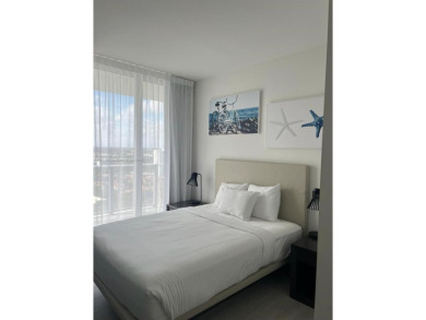 Stunning 3-bedroom, 2-bath unit located in a  luxury high-rise