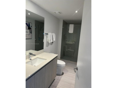 Stunning 3-bedroom, 2-bath unit located in a  luxury high-rise