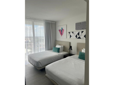 Stunning 3-bedroom, 2-bath unit located in a  luxury high-rise