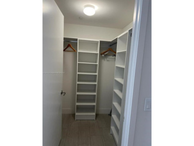 Stunning 3-bedroom, 2-bath unit located in a  luxury high-rise