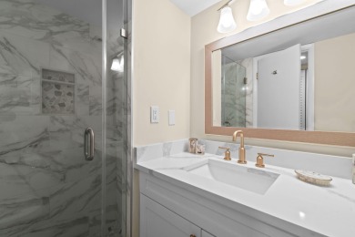 Enjoy oceanfront Palm Beach living in this completely renovated