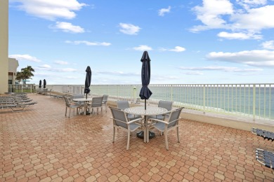 Enjoy oceanfront Palm Beach living in this completely renovated
