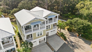 Discover one of Kure Beach's premier properties - a truly