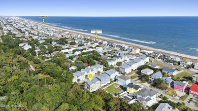 Discover one of Kure Beach's premier properties - a truly