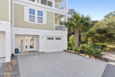 Discover one of Kure Beach's premier properties - a truly