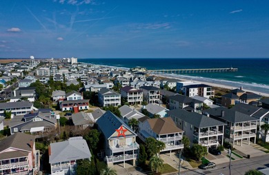 Experience elevated coastal living on highly sought-after