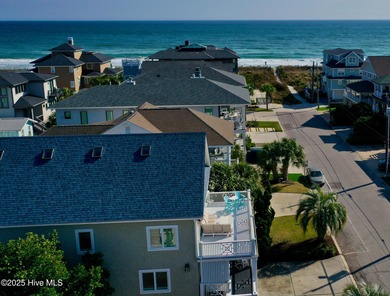 Experience elevated coastal living on highly sought-after