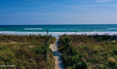 Experience elevated coastal living on highly sought-after