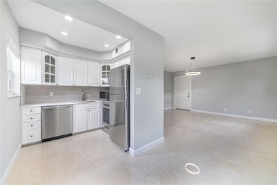 BEAUTIFULLY RENOVATED CORNER UNIT IN VICTORIA PARK, INCLUDING: