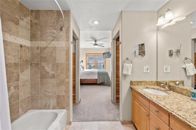 Enjoy expansive mountain and river views from this bright