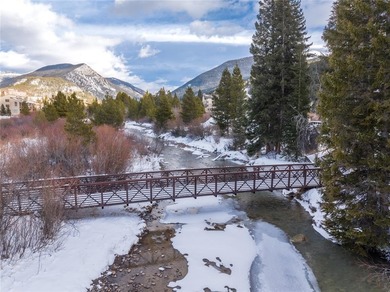 Enjoy expansive mountain and river views from this bright