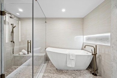 Experience rarified luxury in this newly completed, high-design