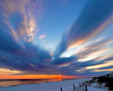 Experience coastal elegance in this furnished 2-bedroom, 2-bath