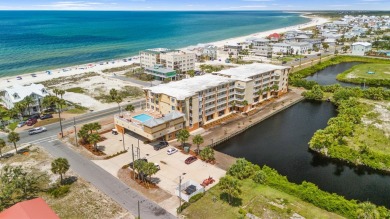 Experience coastal elegance in this furnished 2-bedroom, 2-bath
