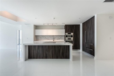 Welcome to this 19th floor corner unit boasting bay views and