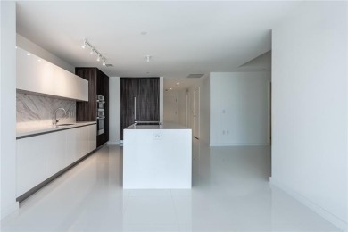 Welcome to this 19th floor corner unit boasting bay views and