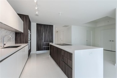 Welcome to this 19th floor corner unit boasting bay views and