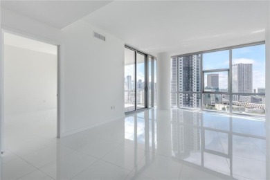 Welcome to this 19th floor corner unit boasting bay views and