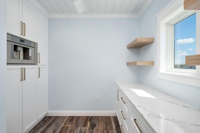 Welcome to 124 Sugar Sand West - a beautifully designed, fully