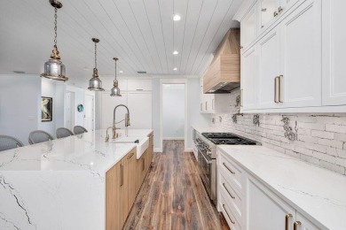 Welcome to 124 Sugar Sand West - a beautifully designed, fully