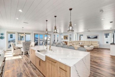 Welcome to 124 Sugar Sand West - a beautifully designed, fully