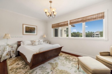 Inside guard-gated Islands of Cocoplum, this individually gated