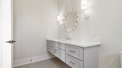 Discover the pinnacle of coastal elegance in this stunning