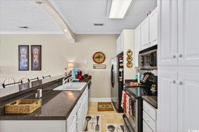 Welcome to this 3 bedroom, 2 bathroom condo in the gated